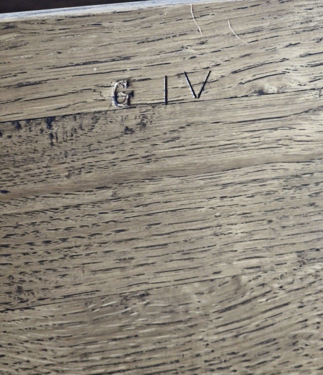 Stamp mark G IV on oak carcase — workshop assembly numbering