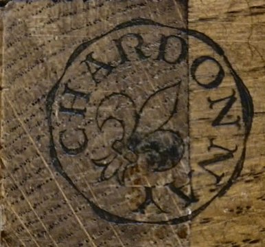 CHARDONNAY estampille detail showing circular stamp with fleur-de-lys centre